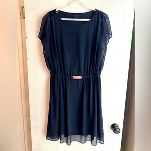 Elegant navy blue mini dress with silver detail